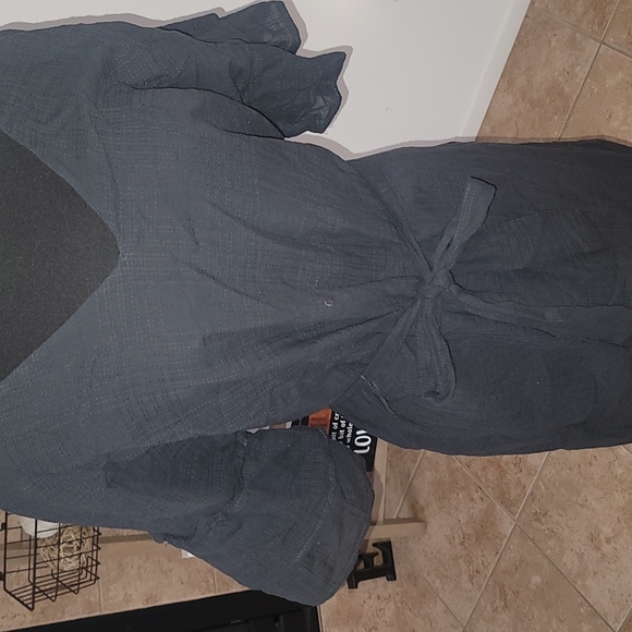 Black dress lined w tie and flow on sleeves - Picture 2 of 8